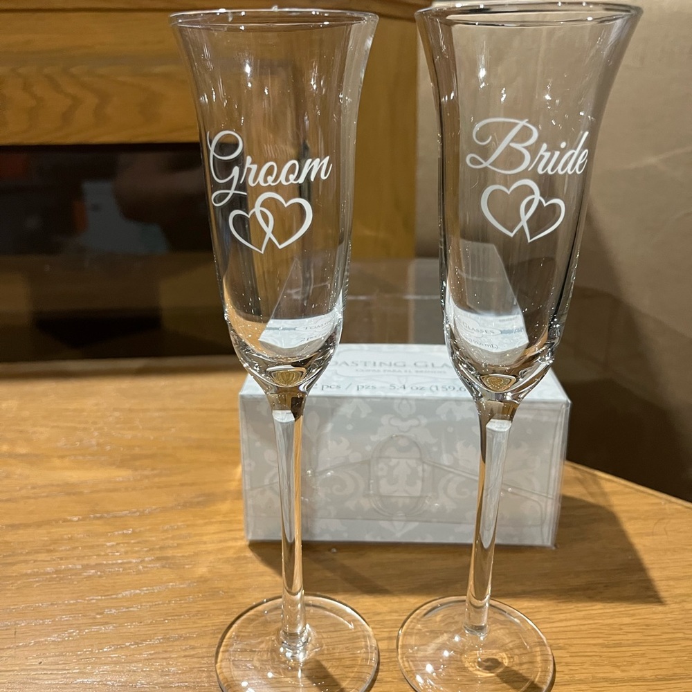 Bride & Groom toasting glasses.